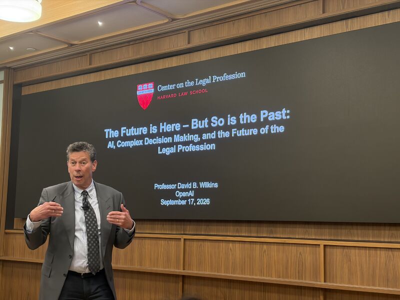 David B. Wilkins delivering his keynote beside its title slide at OpenAI’s New York event on 17 September 2026.