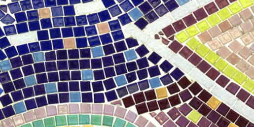 Snapshot of a mosaic with various tiles in different colors.