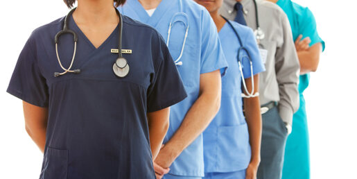 Image of various Physician Assistant's standing in their scrubs.