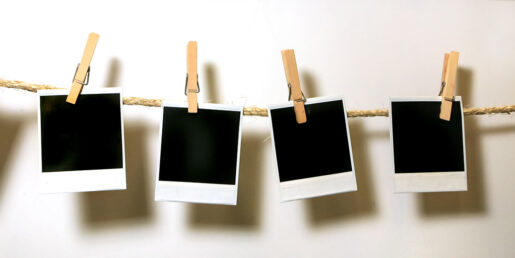 This photo shows multiple polaroids clipped to a clothesline.