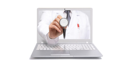 A doctor reaches through the computer with a stethoscope.