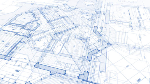 Blue prints show the outlines of architectural plans.