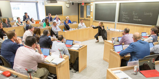 Image of a professor teaching in an HLS classroom.