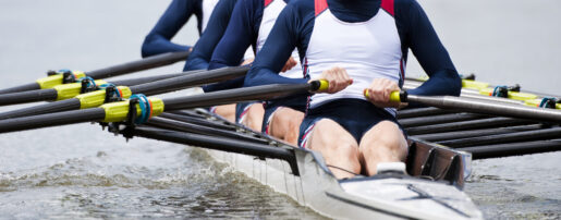 Image of individuals rowing crew.
