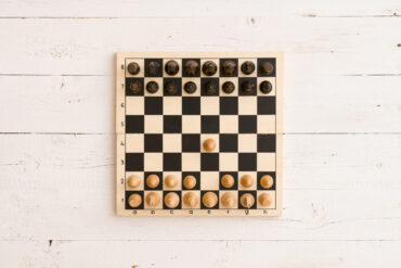 A chess board viewed from up top.