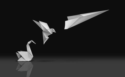An origami swan transforms into a paper plane and soars.