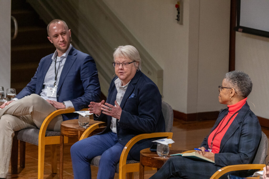 Ben Jackson, Kellye Testy, and Verna Williams talk on stage.